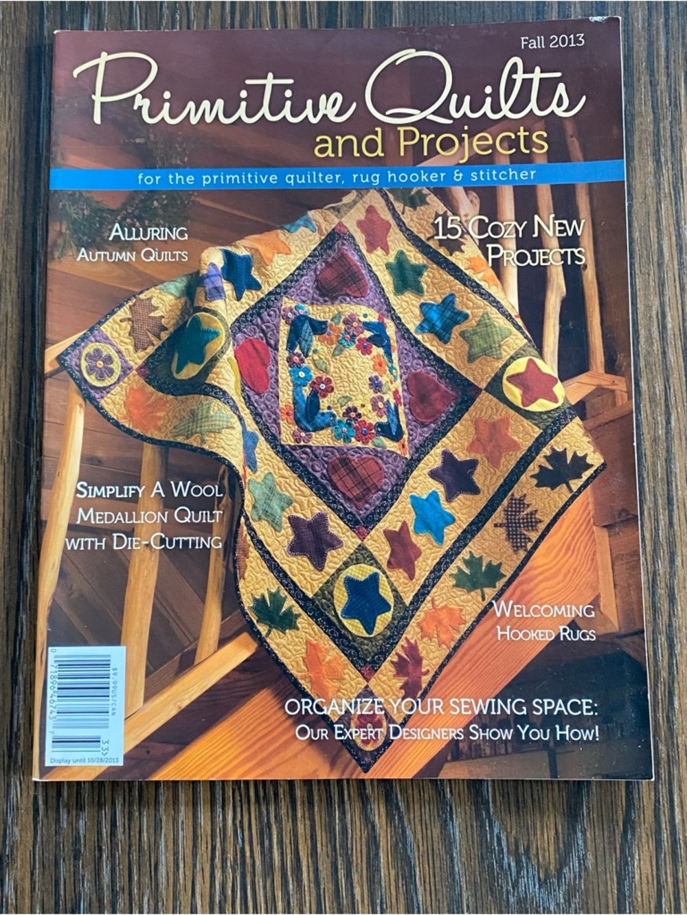Moda Patchwork Quilt Advertisement in Cream, Blue, Gold, Burgundy, Green